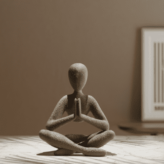 Stone figure in lotus position, hands in prayer. NObody prayer statue.